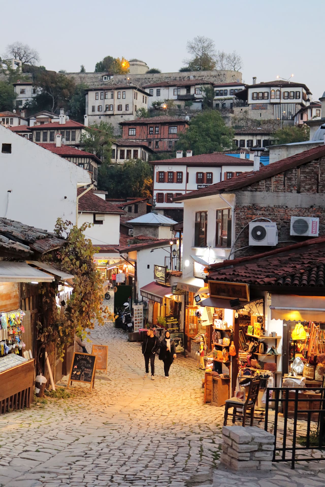 Cobbled bazaar lane with craft shops in the Safranbolu old town at dusk